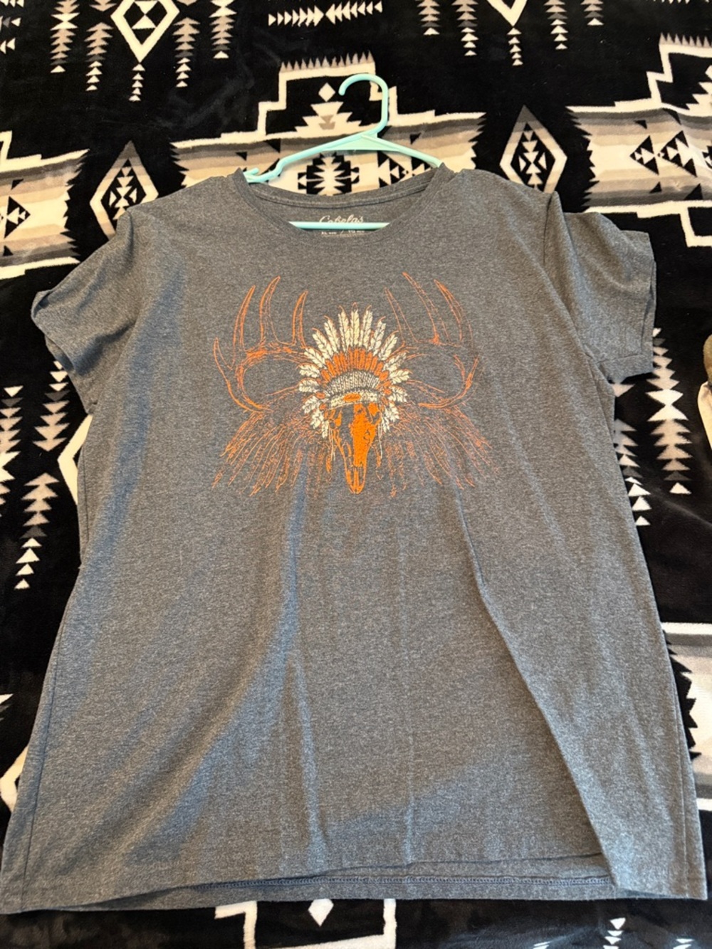 Cozy Grey Graphic Tee with Orange Skull & Feather Motif